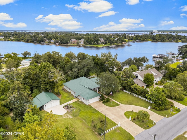 birds eye view of property with a water view