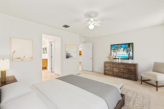 carpeted spare room with ceiling fan and a textured ceiling