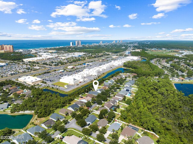 drone / aerial view with a water view