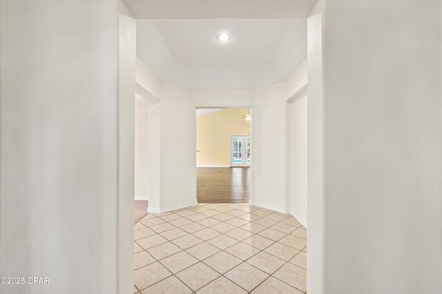 carpeted spare room featuring an inviting chandelier, crown molding, and a textured ceiling