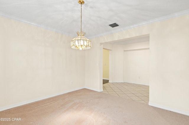 empty room with ornamental molding, light carpet, and an inviting chandelier