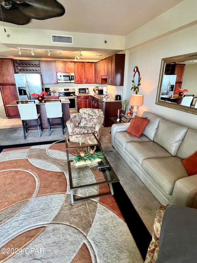 living room with light colored carpet