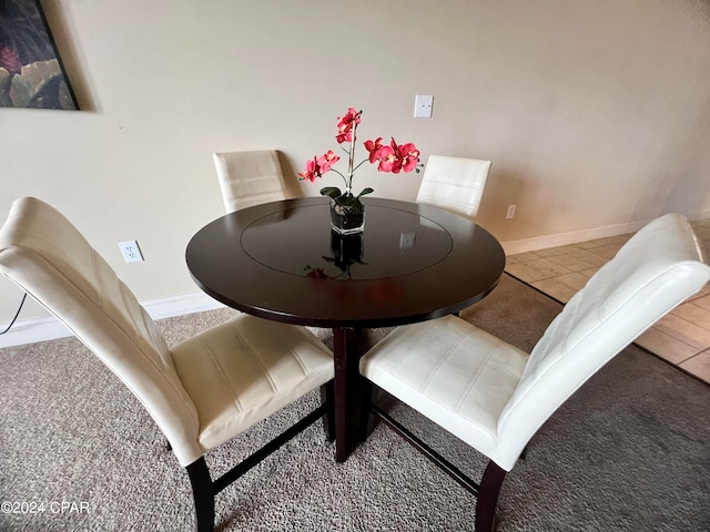 dining room with light tile patterned floors