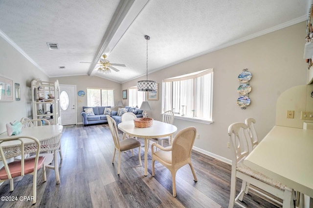 dining space featuring ceiling fan, vaulted ceiling with beams, ornamental molding, a textured ceiling, and dark hardwood / wood-style flooring