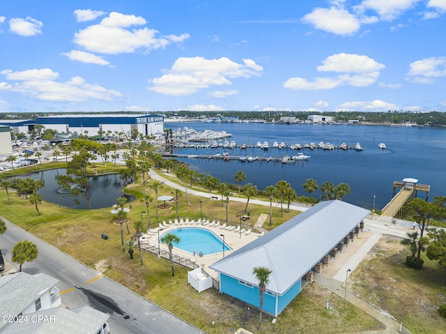 birds eye view of property with a water view