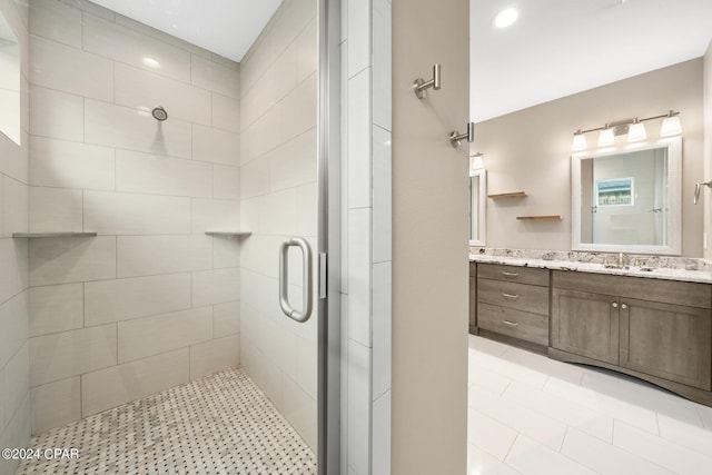 bathroom featuring vanity and walk in shower