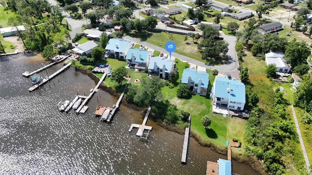 bird's eye view with a water view