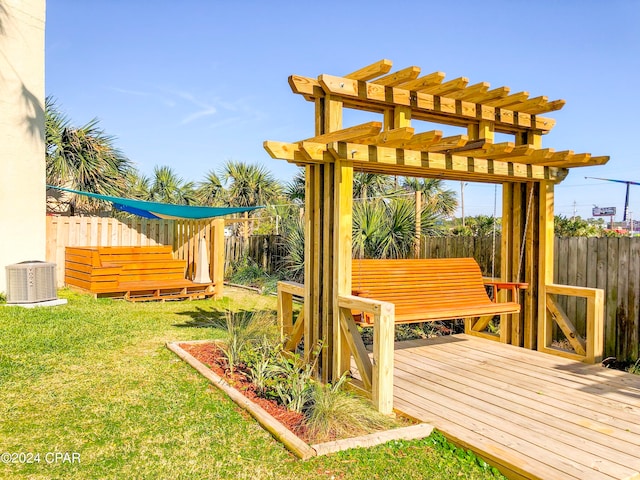 exterior space with a pergola and a wooden deck