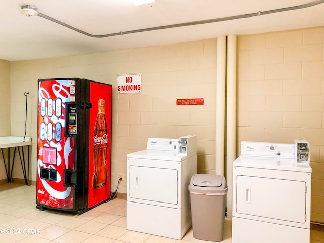 laundry area with washing machine and clothes dryer