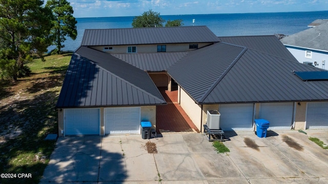 view of front of house featuring a water view