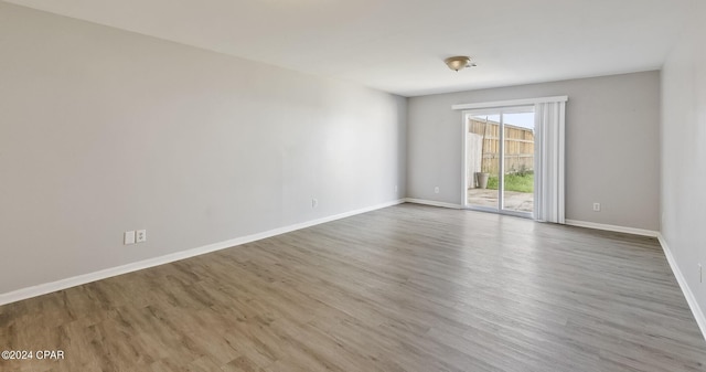 empty room with light wood-type flooring