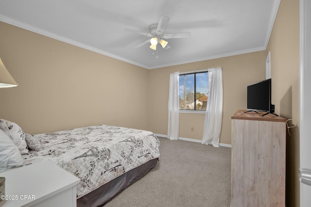 bedroom with crown molding, ceiling fan, and carpet flooring