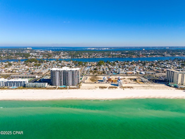 bird's eye view with a water view and a view of the beach