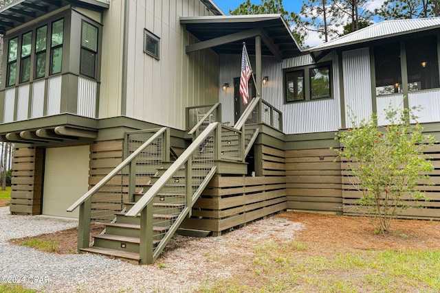 doorway to property with an attached garage