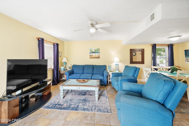 living room featuring ceiling fan