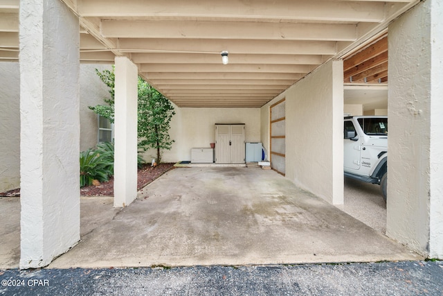 view of patio / terrace featuring a carport