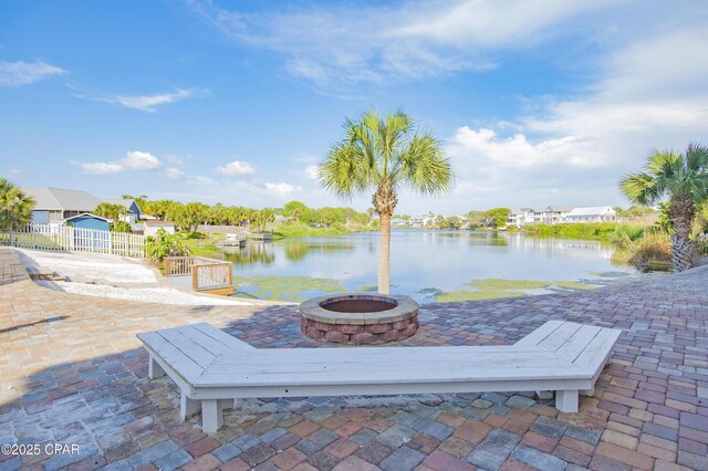 112 Riviera Dr, Panama City Beach, FL 32413 - view of patio / terrace featuring a fire pit and a water view