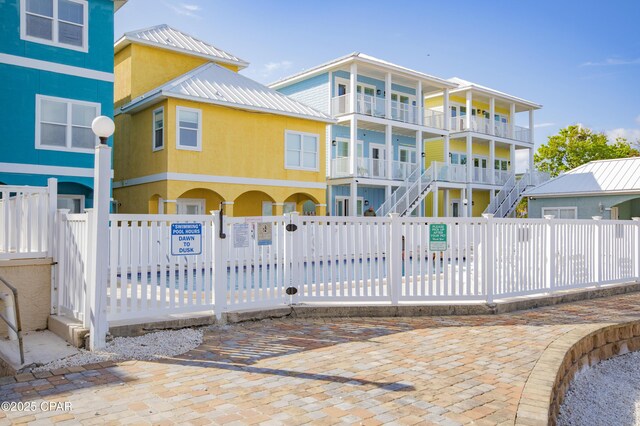 112 Riviera Dr, Panama City Beach, FL 32413 - gate with a fenced front yard