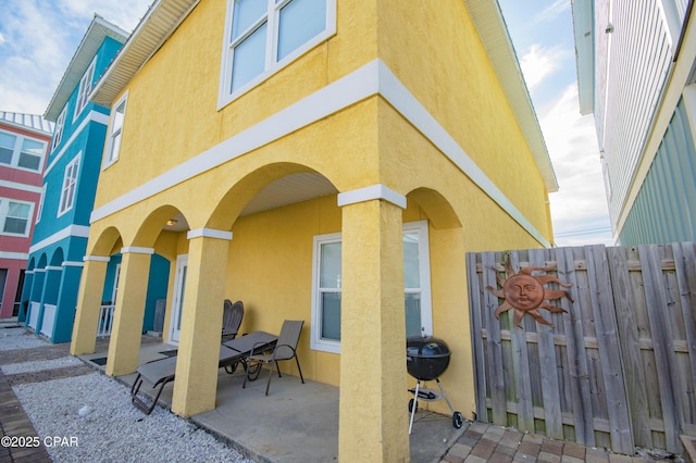 112 Riviera Dr, Panama City Beach, FL 32413 - view of patio featuring a grill