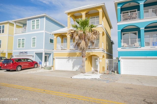 112 Riviera Dr, Panama City Beach, FL 32413 - view of front of home featuring an attached garage and driveway