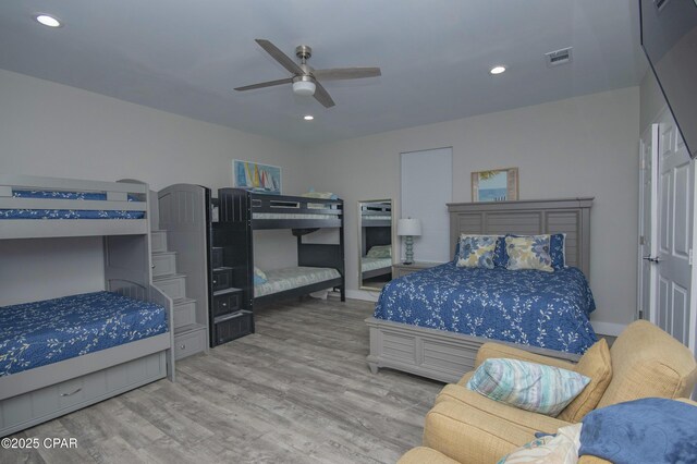 112 Riviera Dr, Panama City Beach, FL 32413 - bedroom featuring wood finished floors, recessed lighting, and ceiling fan
