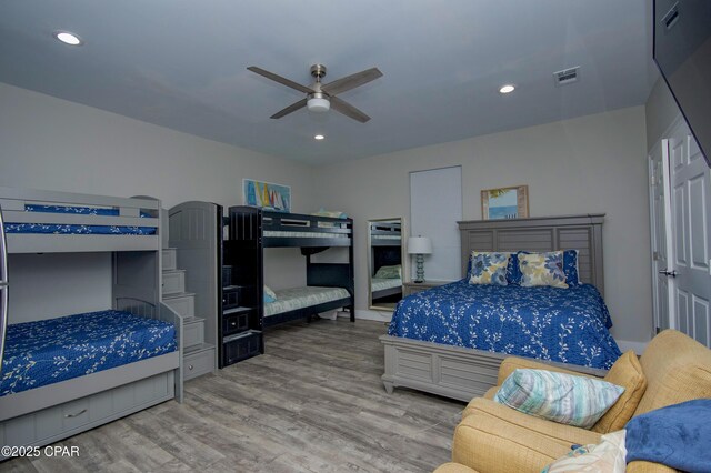 112 Riviera Dr, Panama City Beach, FL 32413 - bedroom with wood finished floors, recessed lighting, and a ceiling fan