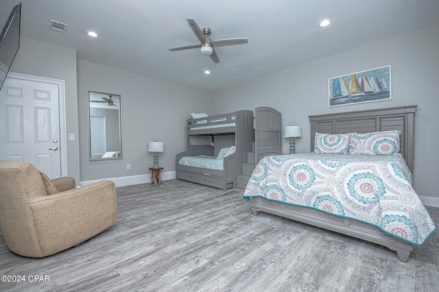 bedroom featuring ceiling fan and light hardwood / wood-style floors