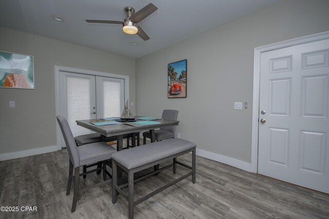 112 Riviera Dr, Panama City Beach, FL 32413 - dining space featuring french doors, light wood finished floors, a ceiling fan, and baseboards