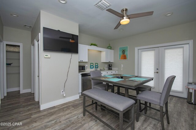 112 Riviera Dr, Panama City Beach, FL 32413 - dining room featuring wood finished floors, a ceiling fan, french doors, baseboards, and recessed lighting