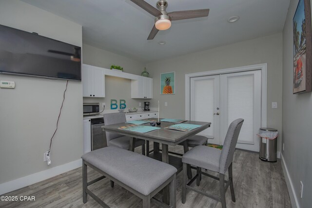 112 Riviera Dr, Panama City Beach, FL 32413 - dining space featuring light wood-style floors, baseboards, and a ceiling fan