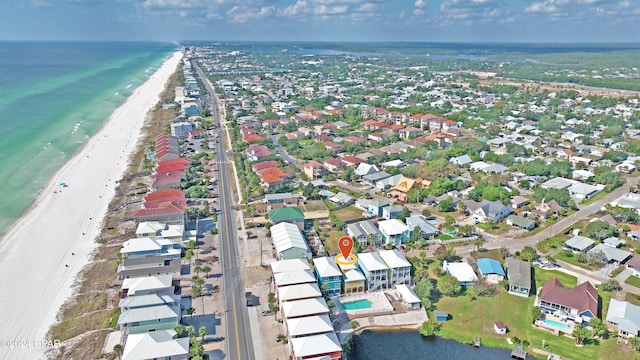 bird's eye view with a beach view and a water view