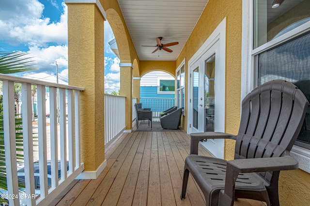 wooden terrace with ceiling fan