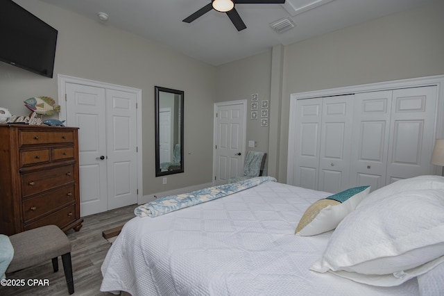 112 Riviera Dr, Panama City Beach, FL 32413 - bedroom with wood finished floors and ceiling fan