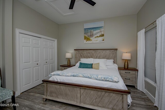 112 Riviera Dr, Panama City Beach, FL 32413 - bedroom featuring wood finished floors, a closet, a ceiling fan, and attic access