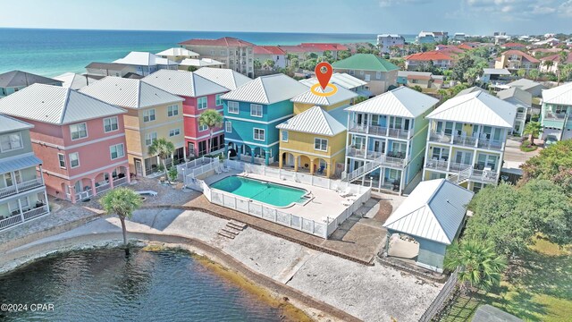 112 Riviera Dr, Panama City Beach, FL 32413 - aerial view of a pool and a large body of water