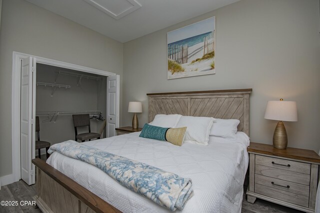 112 Riviera Dr, Panama City Beach, FL 32413 - bedroom with wood finished floors and a closet