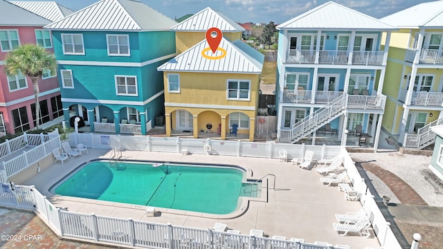 view of swimming pool with a patio