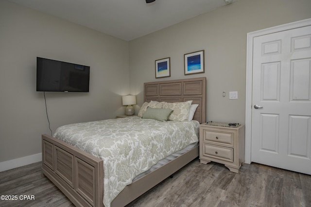 112 Riviera Dr, Panama City Beach, FL 32413 - bedroom with wood finished floors and baseboards