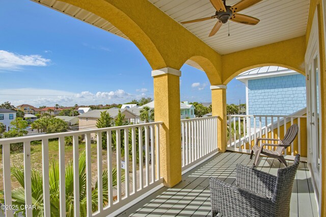 112 Riviera Dr, Panama City Beach, FL 32413 - balcony with ceiling fan and a residential view