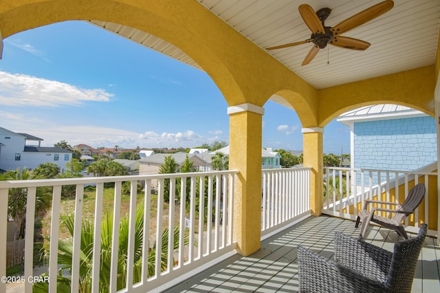 112 Riviera Dr, Panama City Beach, FL 32413 - balcony with ceiling fan and a residential view