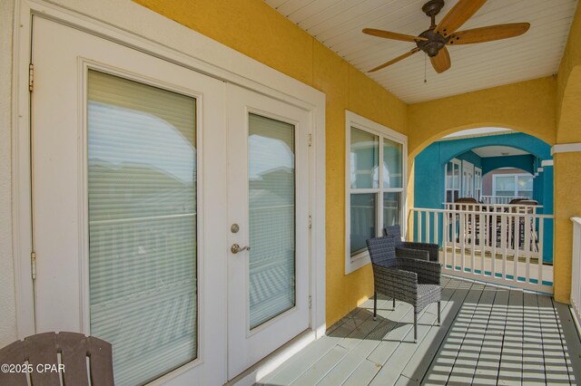 112 Riviera Dr, Panama City Beach, FL 32413 - balcony featuring a ceiling fan and french doors