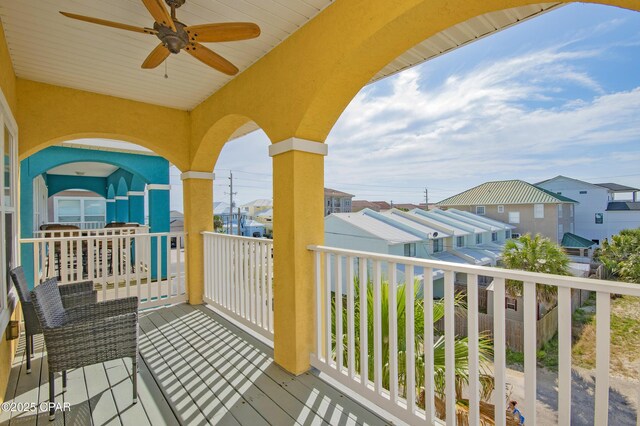 112 Riviera Dr, Panama City Beach, FL 32413 - balcony featuring a ceiling fan and a residential view