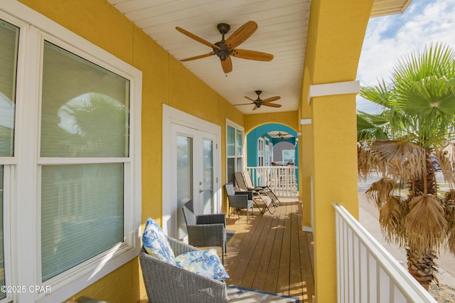 112 Riviera Dr, Panama City Beach, FL 32413 - wooden deck with ceiling fan and french doors