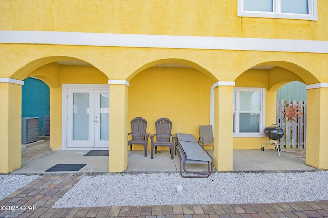 112 Riviera Dr, Panama City Beach, FL 32413 - view of patio featuring french doors and grilling area