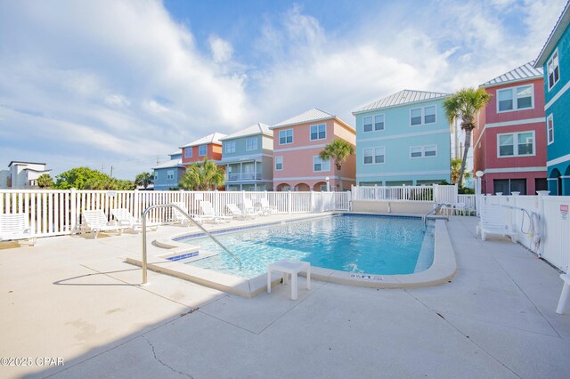 112 Riviera Dr, Panama City Beach, FL 32413 - community pool with a patio and a residential view
