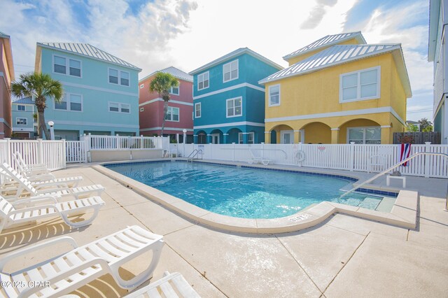 112 Riviera Dr, Panama City Beach, FL 32413 - community pool with a patio area
