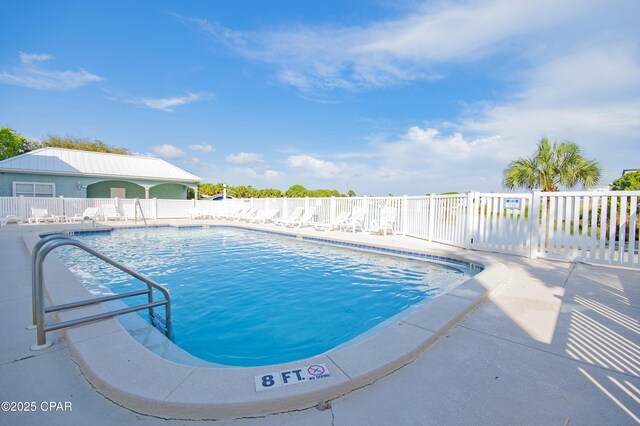 112 Riviera Dr, Panama City Beach, FL 32413 - community pool with a patio area