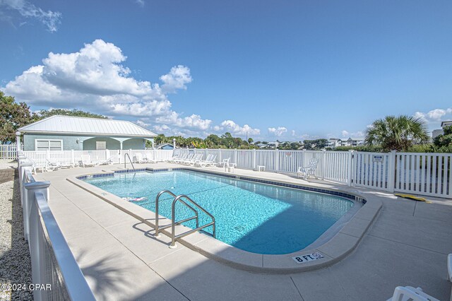 112 Riviera Dr, Panama City Beach, FL 32413 - community pool with a patio area