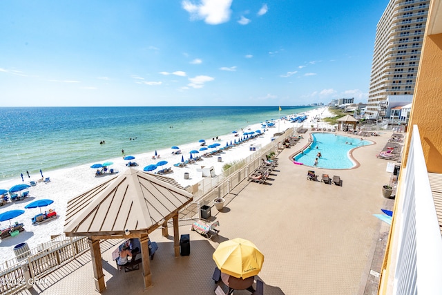 water view featuring a beach view and a gazebo