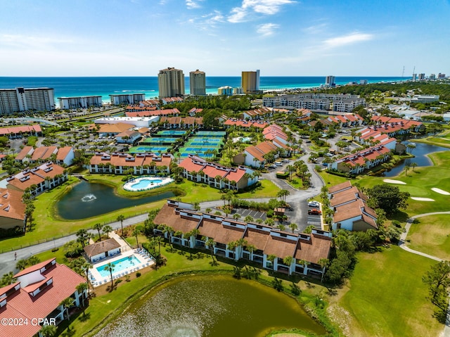 bird's eye view with golf course view and a water view